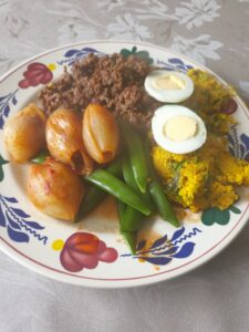 gevulde uien met gele bloemkool rijst